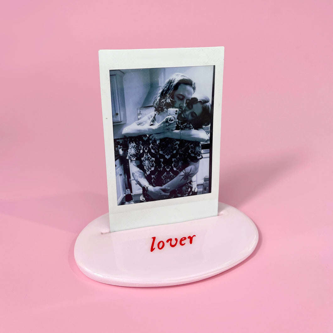 lover pink and red polaroid stand